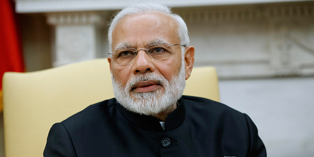 ראש ממשלת הודו נרנדרה מודי חליפה 26.6.17