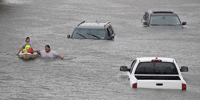 הוריקן הארווי הצפות מכוניות ביטוח נזק יוסטון טקסס