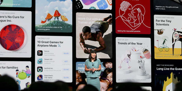 אן ת'אי מנהלת מוצר ב אפסטור על רקע מסכי חנות האפליקציות החדשה בכנס WWDC האחרון