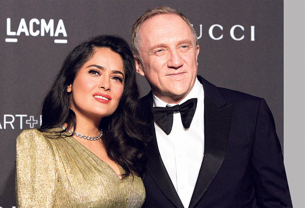 יו"ר קרינג פרנסואה־אנרי פינו ורעייתו סלמה האייק (צילום: אי. פי. אי) פרנסואה הנרי פינו ו סלמה האייק