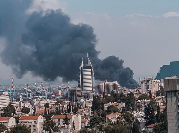 שריפה דליקה אש ב מחסן שמן חיפה