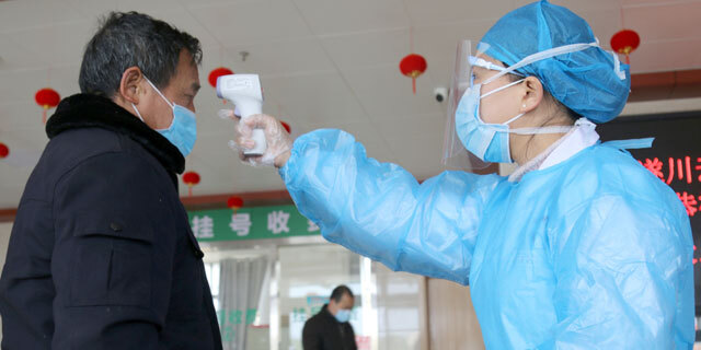 נגיף קורונה וירוס מגיפה בדיקות חום בית חולים סצ'ואן סין