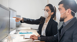 Office workers wearing masks