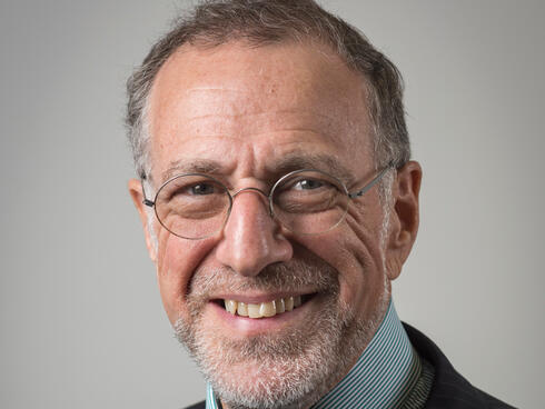 Sir Mick Davis. 
