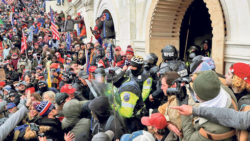 המהומות בבניין הקפיטול, בינואר השנה, צילום: רויטרס