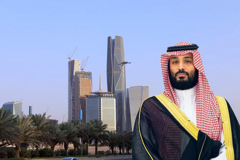 יורש העצר מוחמד בן סלמאן על רקע המגדלים בריאד בירת סעודיה, צילום: איי פי, בלומברג