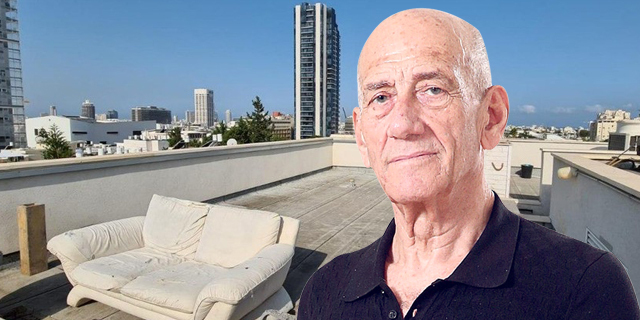 אהוד אולמרט  ברקע גג בניין ברחוב מטמון כהן תל אביב