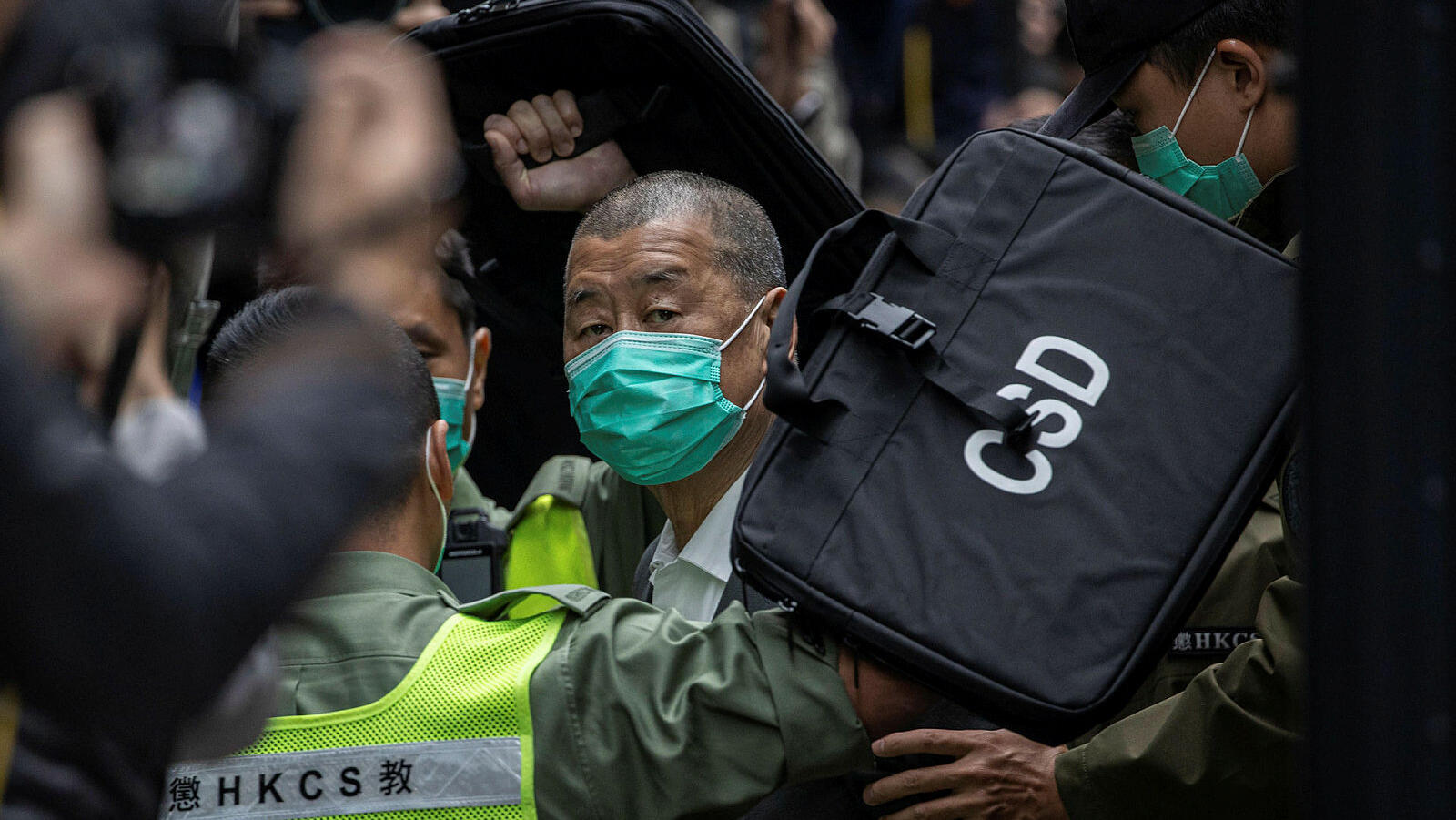 ג'ימי לאי טייקון תקשורת מ הונג קונג נשפט על השתתפות וארגון הפגנות