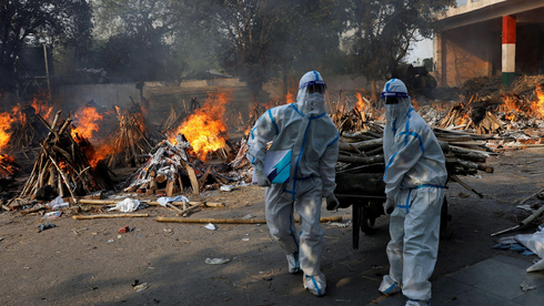 שריפת גופות בהודו, צילום: רויטרס