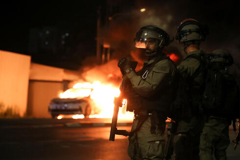 המהומות בלוד, צילום: רויטרס