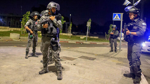 כוחות ביטחון בלוד, הלילה, AFP