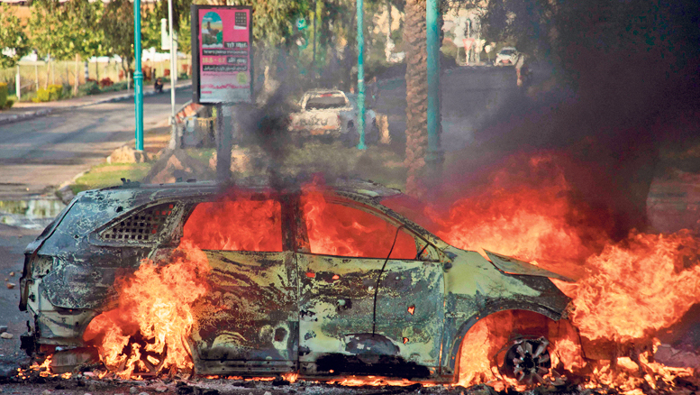 רכב עולה באש בעימותים ב לוד
