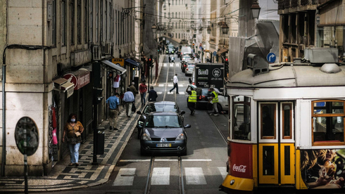מרכז העיר ליסבון, השבוע. הממשלה אסרה על נסיעות ממנה ואליה, צילום: אי פי איי