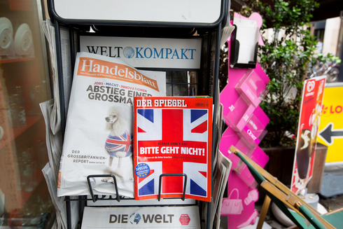 כתבי־עת גרמניים בחנות עיתונים בברלין לקראת הברקזיט, צילום: בלומברג
