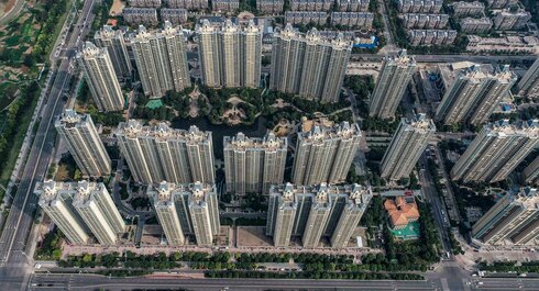 קומפלקס מגורים של חברת אוורגרנד בעיר הויאן בסין, צילום: AFP