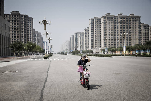 משבר נדל"ן בסין עלול להוביל למשבר עולמי, צילום: בלומברג