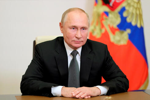 האם ההאקרים פעלו בשליחות הקרמלין? נשיא רוסיה ולדימיר פוטין, צילום: רויטרס