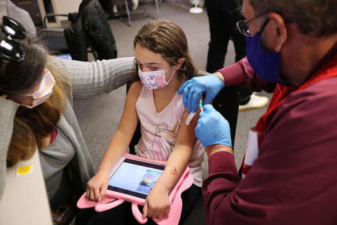 בקופות החולים מדווחים על היענות לחיסונים, AFP
