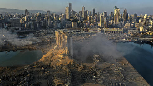 הנזק מהפיצוץ בנמל ביירות ביוני 2021, צילום מועמד לפוליצר של חוסיין מאלה. בכמה יימכר בתור NFT?, צילום: AP