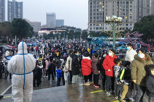 בדיקות קורונה בעיר הנמל נינגבו, סין, צילום: AFP