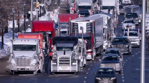 הפגנת נהגי משאיות בקנדה. בדיקות בכניסה לארה"ב, צילום: AP