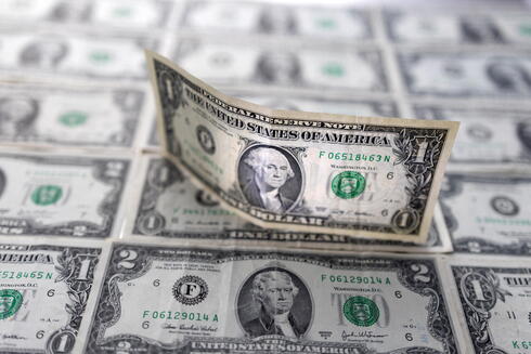 מטבע חוף המבטחים: הדולר מזנק בעולם, צילום: רויטרס