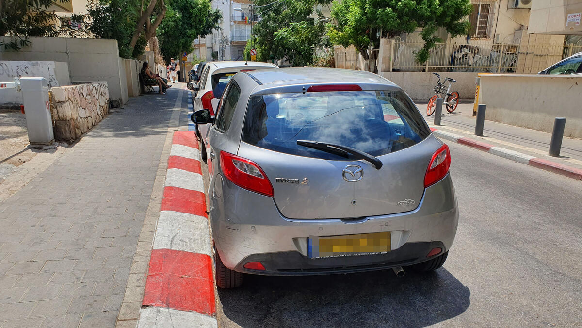 חניה לא חוקית ב תל אביב מצוקת חניה אדום לבן