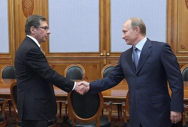 פטר אוון בפגישה עם פוטין ב-2010, צילום: AFP
