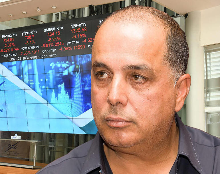 עמוס לוזון על רקע הבורסה לניירות ערך בתל אביב