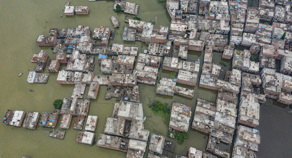 פוטו הצפות פקיסטן בתים מוקפים מים