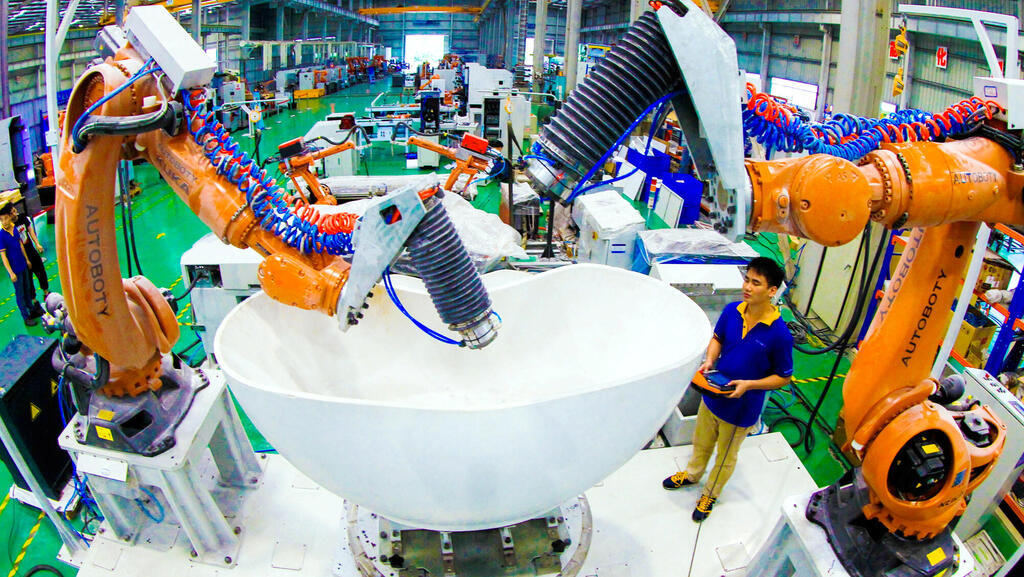 כוח העבודה מתכווץ, רובוטים יעזרו לסין לשמור על יתרון בייצור