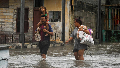 ההצפות בקובה, AFP