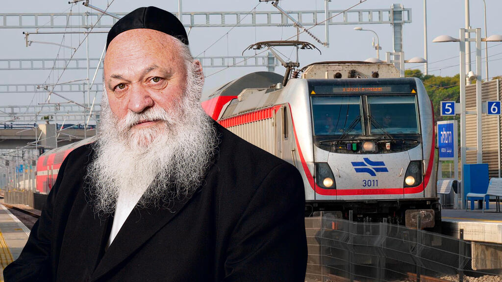 שר השיכון יצחק גולדקנופף על רקע רכבת ישראל