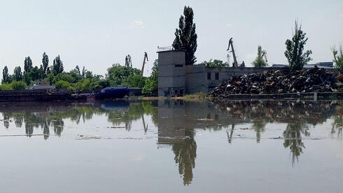 ההצפה בעקבות פיצוץ הסכר באוקראינה, צילום: Sergiy Dollar / AFP