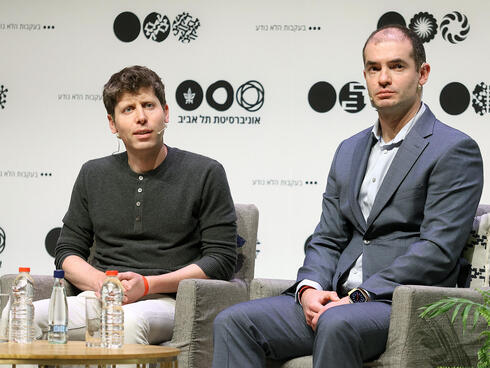 Ilya Sutskever alongside Sam Altman. 