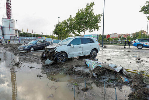 שטפונות בסרגוסה, ספרד, צילום: EPA/JAVIER CEBOLLADA
