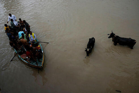 שטפונות בניו דלהי, השבוע, צילום: REUTERS/Adnan Abidi REFILE