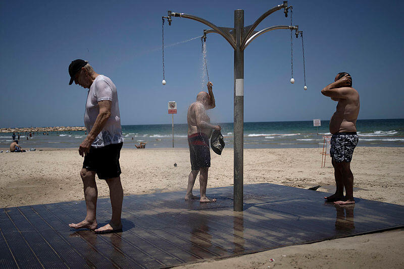 תל אביב יולי 2023 גל חום משבר האקלים
