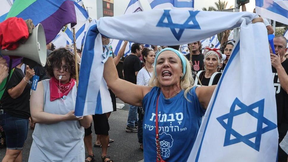 מפגינים נגד הרפורמה המשטרית (צילום: גיל נחושתן) מפגינים בצומת כרכור הפיכה משטרית 12.8.23