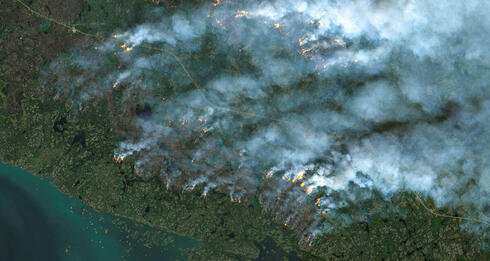 צילום לוויון של השריפות בקנדה, צילום: AFP PHOTO / European Space Agency (ESA)