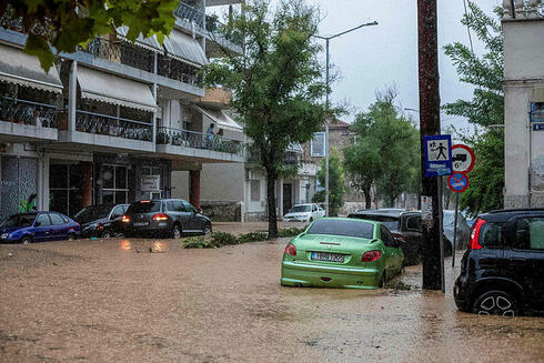 השטפונות ביוון בעיר וולס, צילום: Photo by EUROKINISSI / EUROKINISSI / AFP