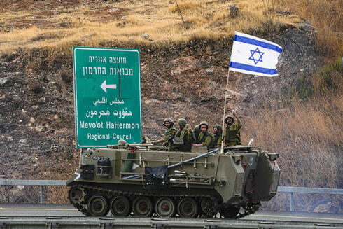 כוחות צה"ל סמוך לגבול לבנון, אתמול, צילום: AP Photo/Ariel Schalit