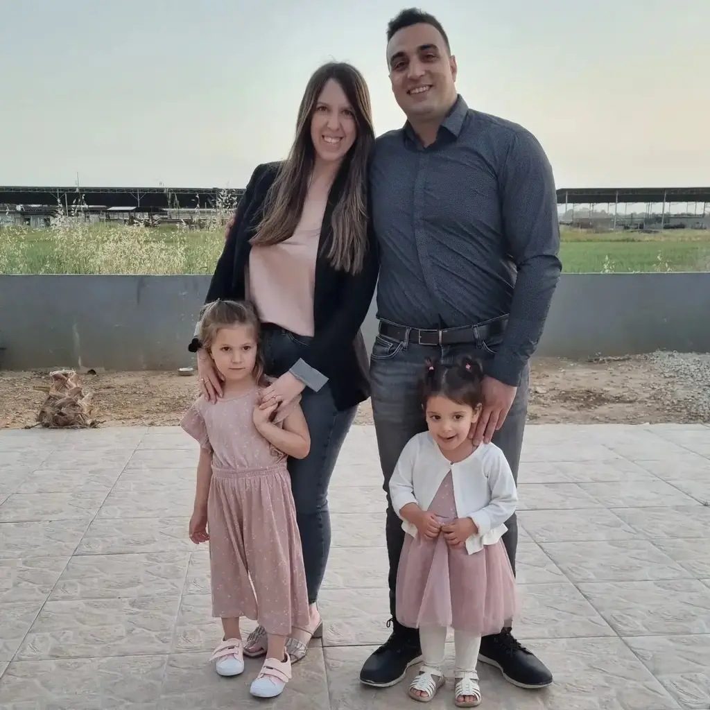 Doron Asher and her daughters Raz and Aviv are hostages in Gaza, here pictured with father, Yoni Asher.