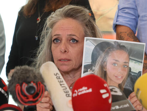 Karen Schem holds a photo of her 20-year-old daughter Mia, a hostage in Gaza. 