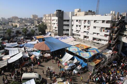 בית החולים שיפא בעזה, צילום: Bashar TALEB / AFP