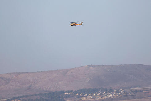 הליקופטר של צה"ל מפטרל בגבול לבנון, צילום: jalaa marey / AFP