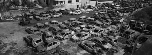 מגרש מכוניות שהוצת בעירייה חווארה, צילום: אורן זיו