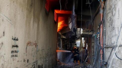 חאן יונס, צילום: REUTERS/Ibraheem Abu Mustafa