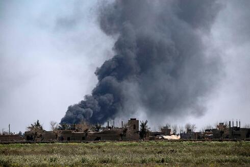 תיעוד מ-2019 של הפצצת שיירה של 25 כלים בשטח עיראק, בדרך מאיראן ללבנון, צילום: AFP