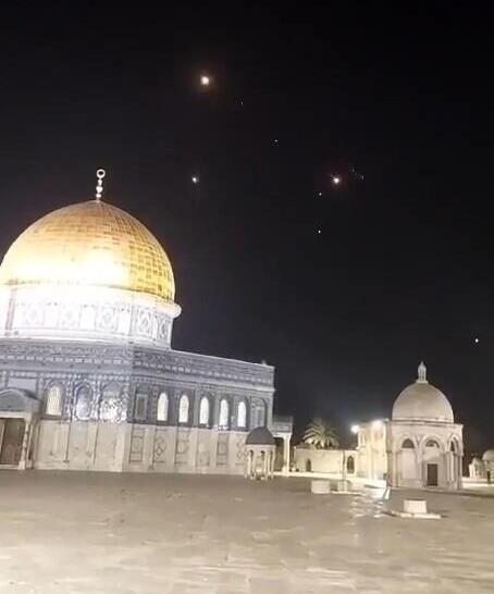 Iranian missiles being intercepted over the Dome of the Rock in Jerusalem. 